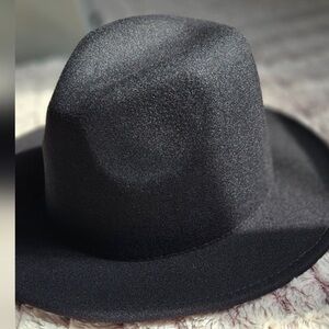 NWOT Black Fedora Hat. Polyester/cotton blend material.